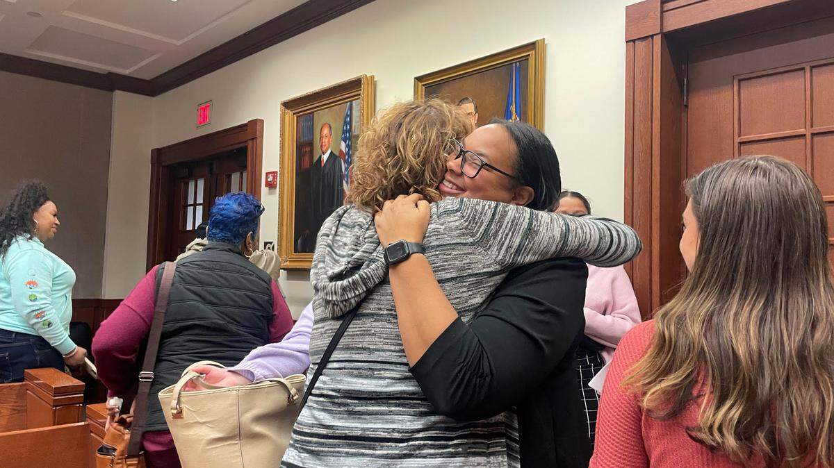 Lasielle White, 29, hugs family and friends after a judge granted her five years probation during a sentencing hearing on Thursday.