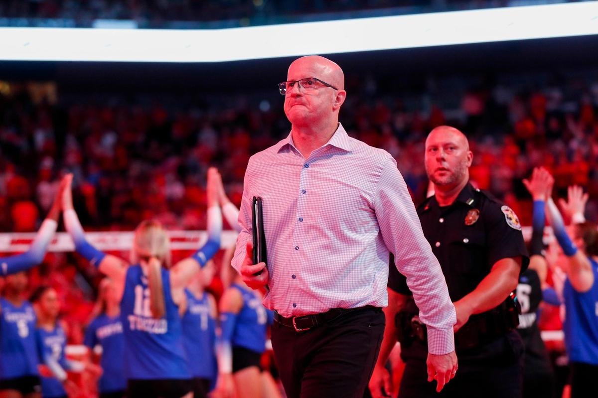 Kentucky head coach Craig Skinner walks off the court after his Wildcats were defeated by Louisville in three sets at the KFC Yum! Center on Wednesday.
