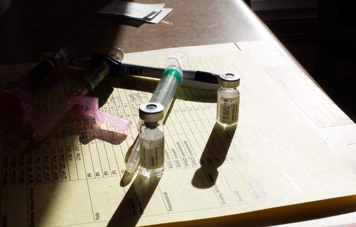 Syringes and vaccines lay on a table at the WeCare Clinic in Fairview, Kentucky, which services area Amish and Mennonite patients.