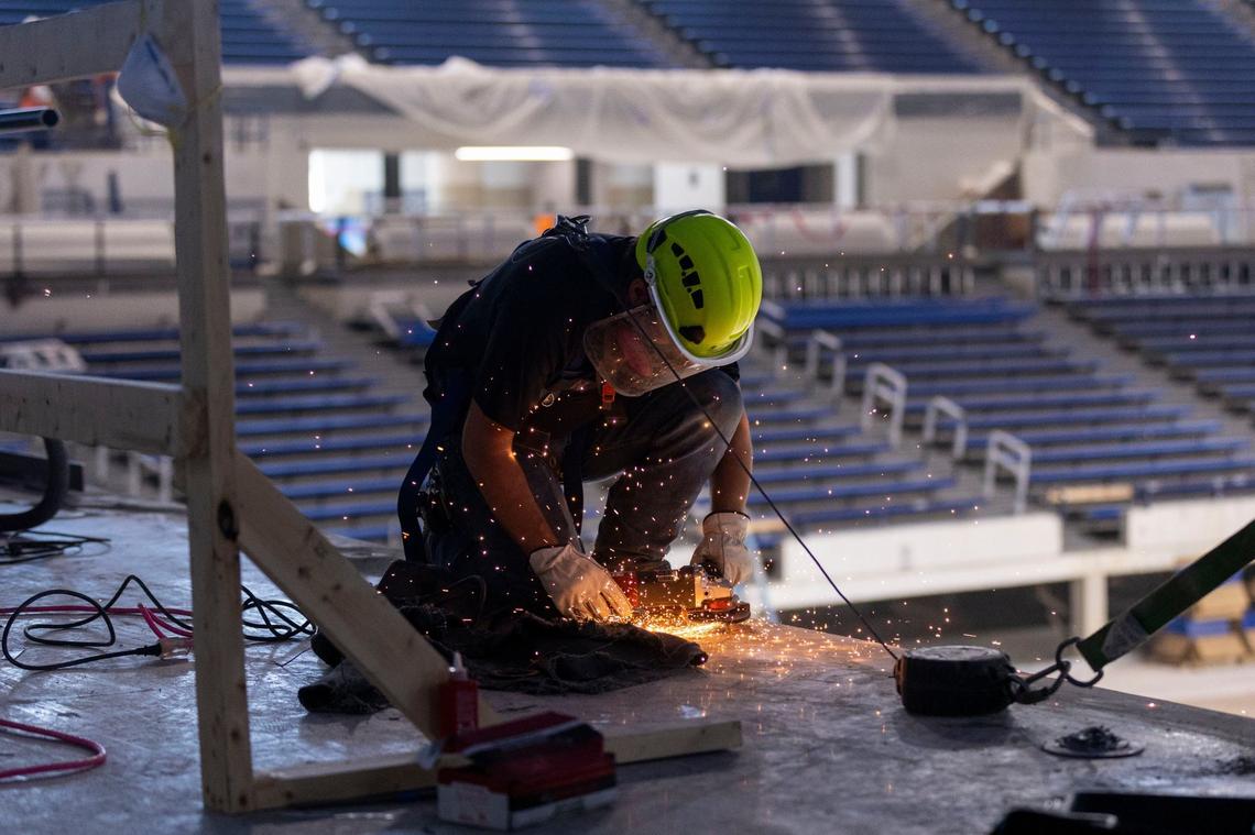 Work continued inside Memorial Coliseum on Friday as the 74-year-old building’s $82 million renovation neared completion. UK made upgrades to the HVAC system, ceiling, scoreboard and numerous other areas of the building.