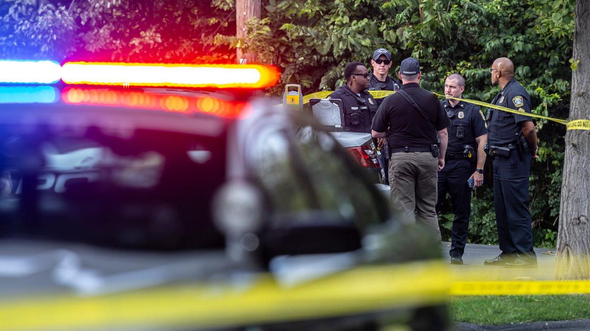 Members of the Lexington Police Department respond to the report of a shooting in the 2000 block of Cambridge Drive in Lexington, Ky., on Tuesday, Sept. 3, 2024.