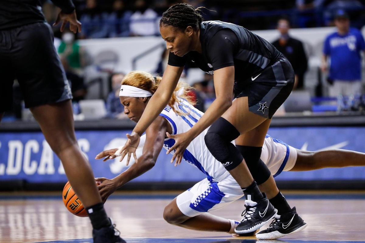 Kentucky’s Rhyne Howard dives to the floor in pursuit of a loose ball during the Wildcats’ win over Vanderbilt on Thursday night. Howard contributed four rebounds, three assists and two steals in addition to her 17 points.