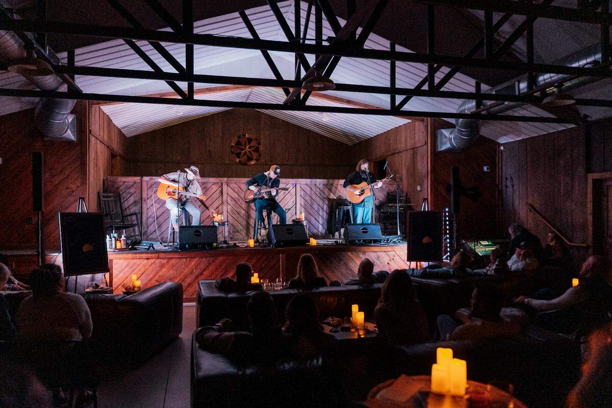 Songwriters in Paradise debuted in Bardstown with music from songwriters, left to right, Django Walker, event founder Patrick Davis and Levi Lowrey.