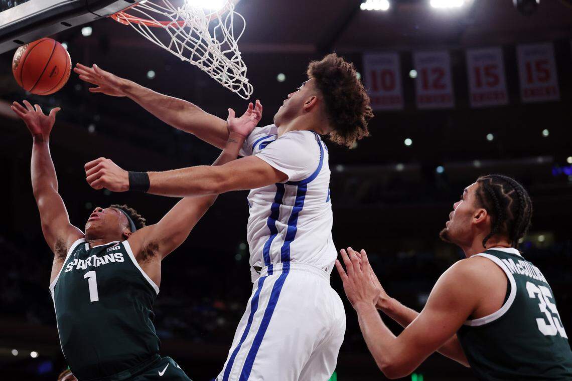 NEW YORK, NEW YORK - NOVEMBER 18: Jeremy Fears Jr. #1 of the Michigan State Spartans goes to the basket as Jasper Johnson #2 of the Kentucky Wildcats defends during the first half  in the 2025 State Farm Champions Classic at Madison Square Garden on November 18, 2025 in New York City. (Photo by Ishika Samant/Getty Images)