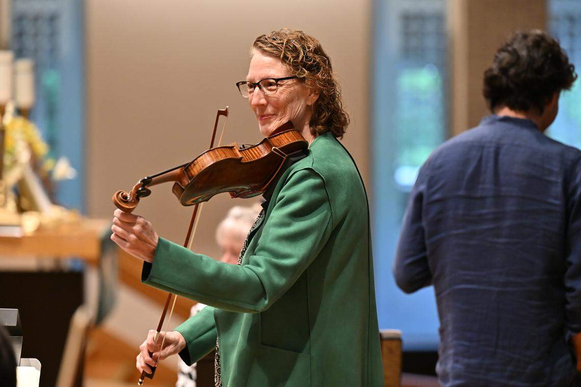 Margie Karp is the concertmaster for the LCO. The Lexington Chamber Orchestra, conducted by Music Director Marcello Cormio, rehearsed for their May 30 concert at the Lexington Opera House at Centenary Church in Lexington, Kentucky on May 27, 2025.