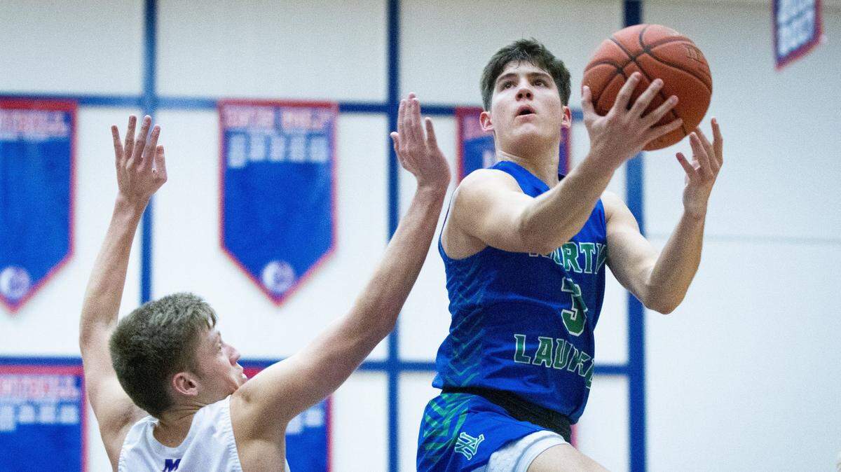 North Laurel guard Reed Sheppard scored 43 points in a victory over Madison Central on Feb. 23. Sheppard, a junior who recently committed to Kentucky, ranks as the No. 1 player in the state this preseason, according to a vote of Kentucky high school coaches.