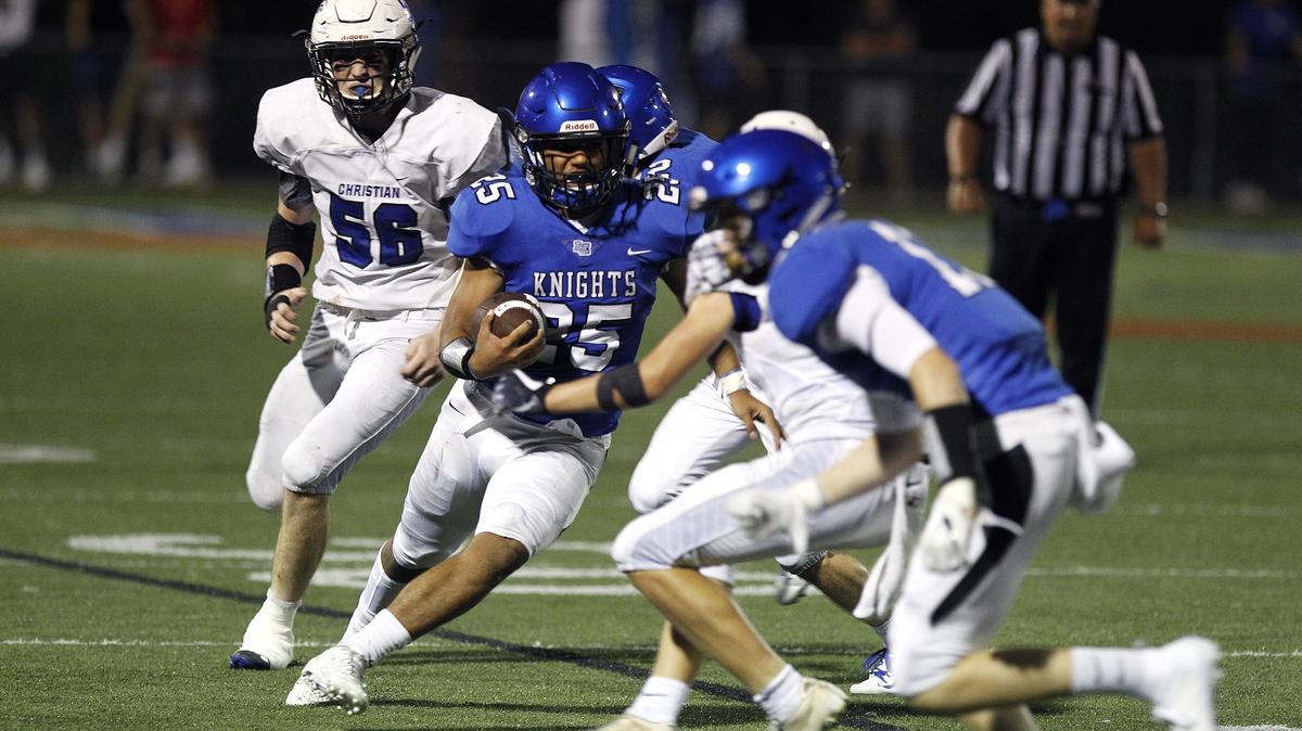 Lexington Catholic’s Ryan Nichols ran Friday night against Lexington Christian.