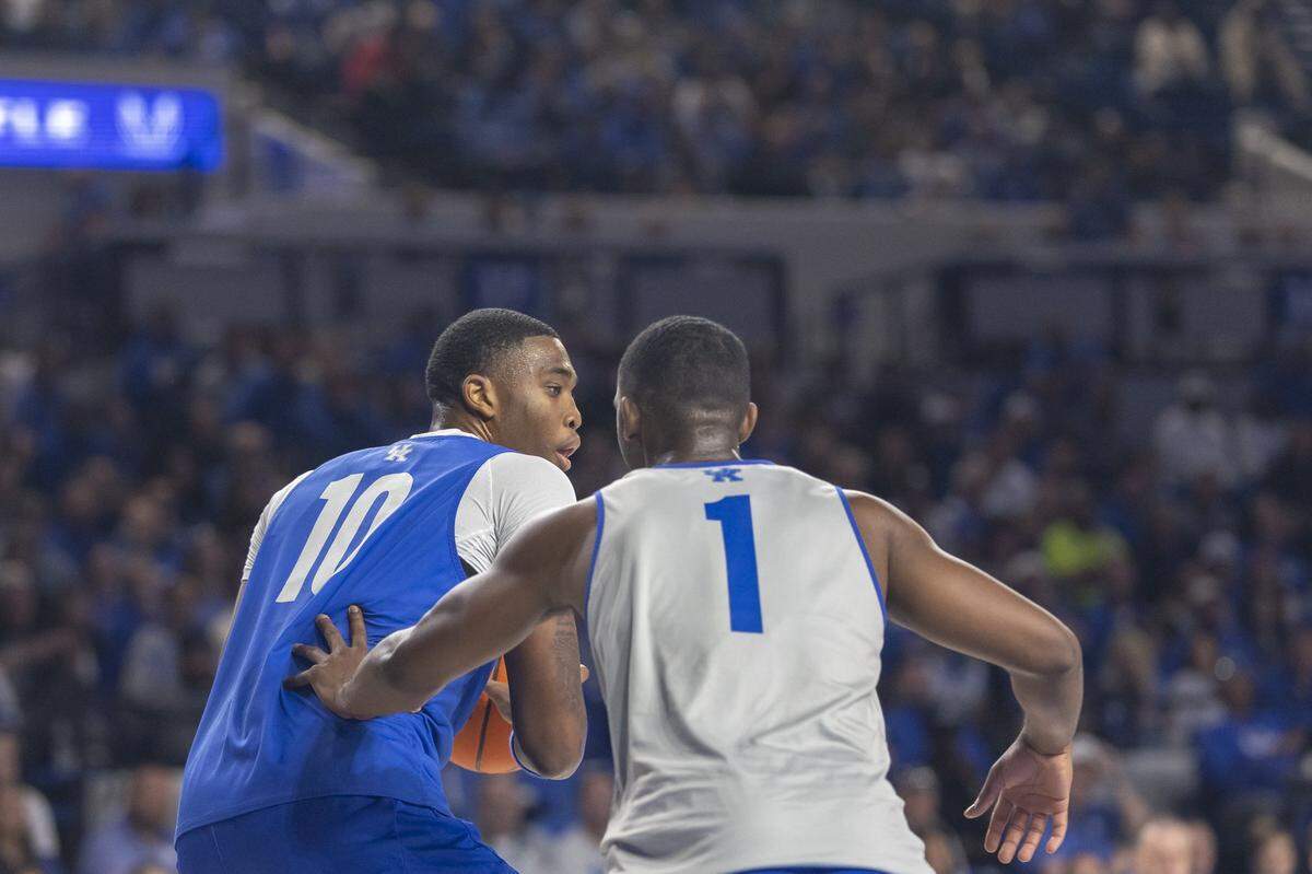 Kentucky forward Brandon Garrison is defended by point guard Lamont Butler during the Blue-White Preseason Event on Friday night.