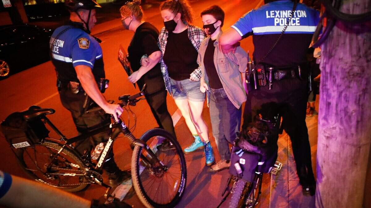 Three protesters were arrested in Lexington Saturday night.