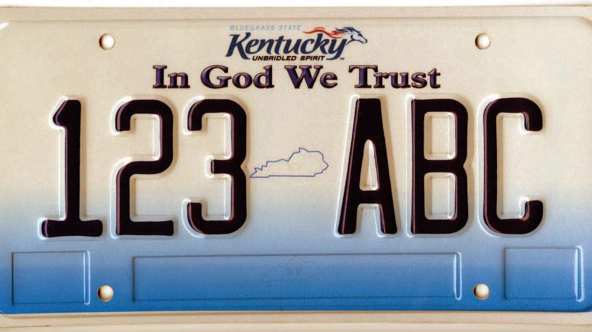  The state has unveiled a new license plate featuring the words "In God We Trust". Starting next year, Kentuckians can choose the standard plate or the In God We Trust plate at no extra charge.
