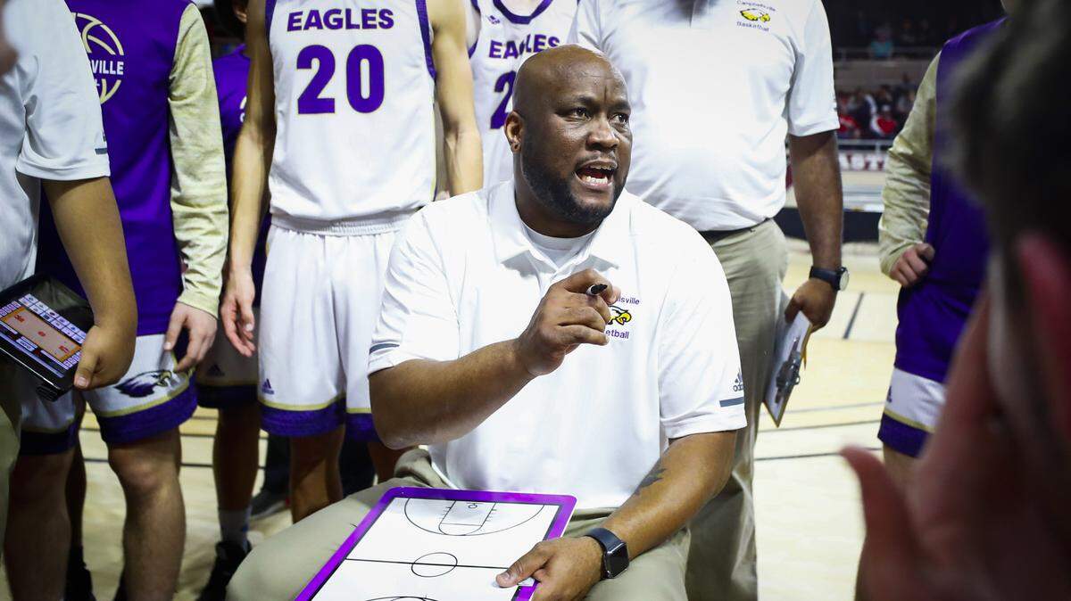 Former Kentucky star and current Campbellsville head coach Anthony Epps spoke to his team during a timeout against St. Henry in the All ‘A’ Classic at Eastern Kentucky University’s McBrayer Arena on Jan. 23.