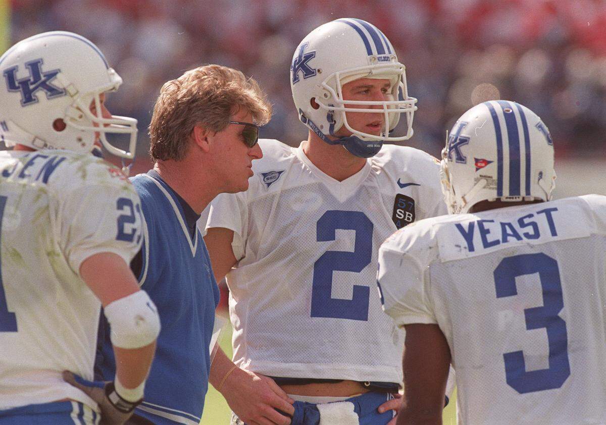 Hal Mumme, in blue shirt, had three wins over teams ranked in The Associated Press Top 25 in his four seasons (1997-2000) as Kentucky Wildcats head football coach.