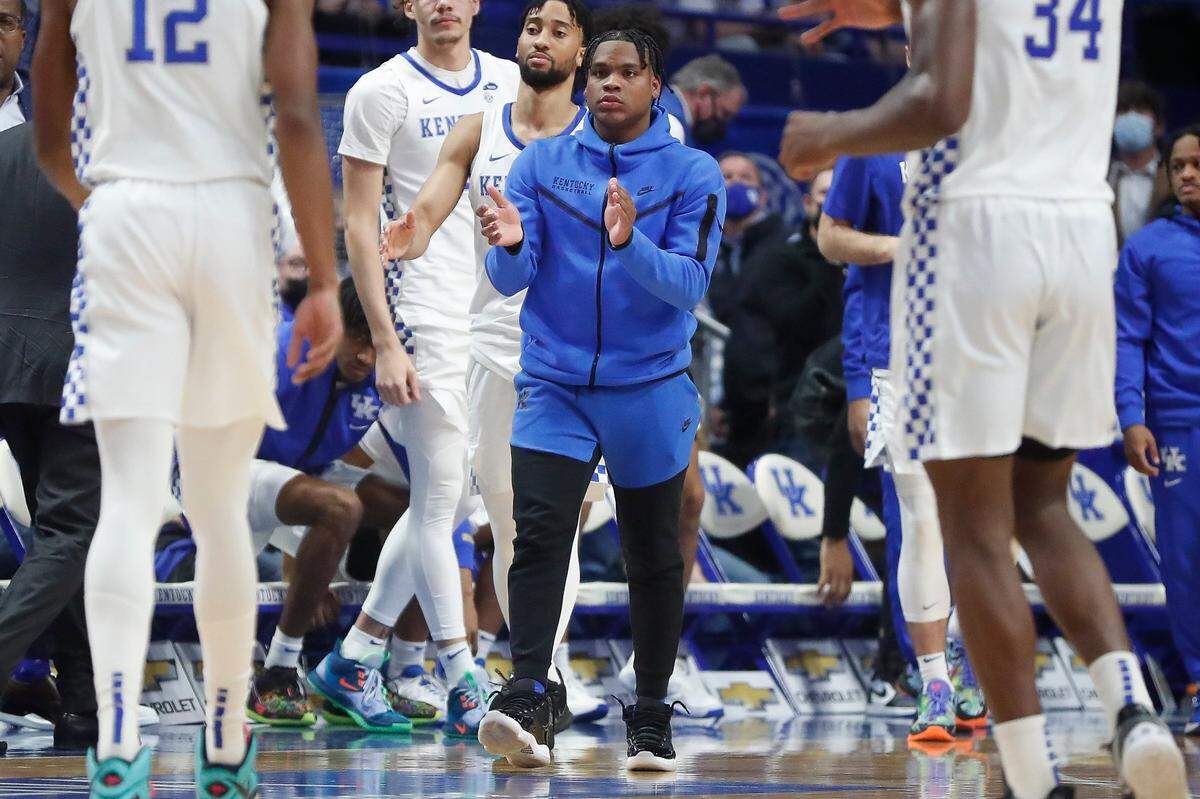 Kentucky guard Sahvir Wheeler cheers on his teammates during a game against the Georgia Bulldogs at Rupp Arena in Lexington, Ky., Saturday, Jan. 8, 2022.