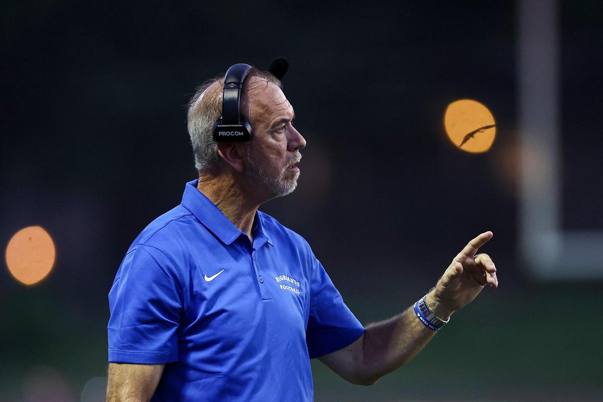 Highlands’ Bob Sphire coaches his team against Lexington Catholic on Friday night. The Bluebirds won 34-27.