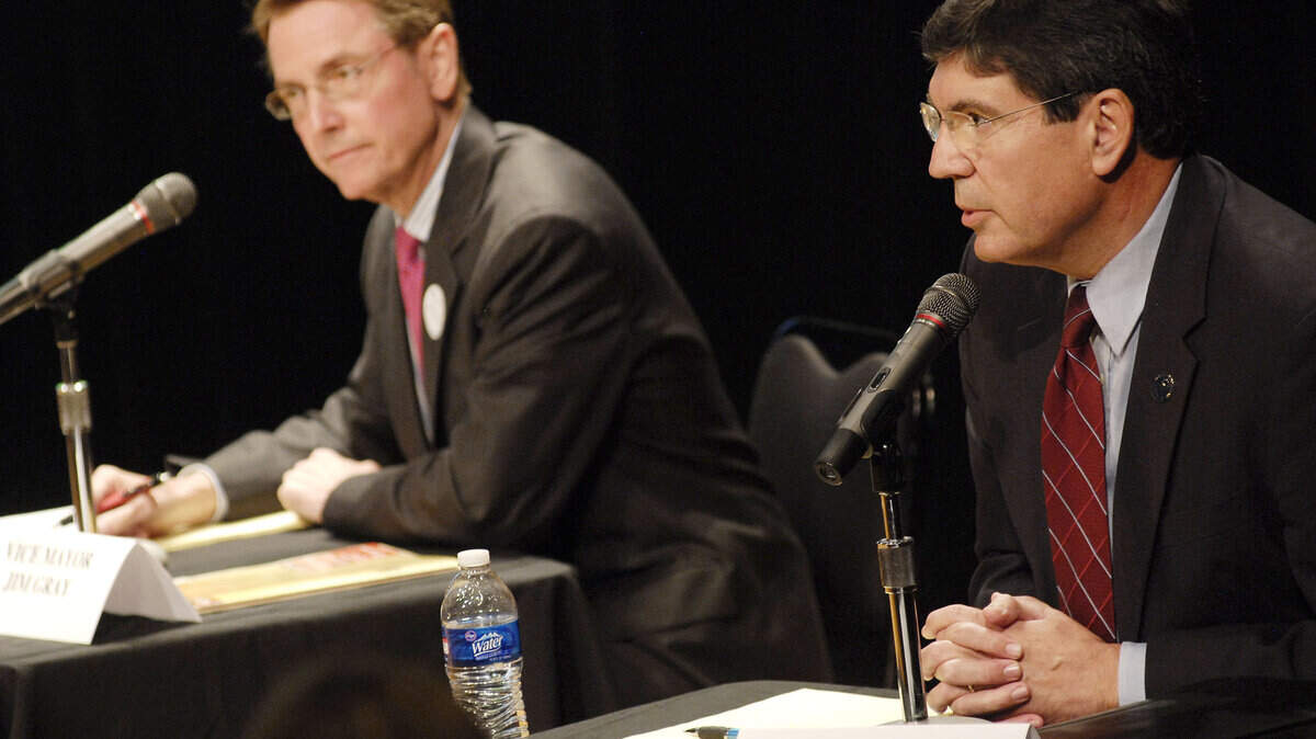 Vice Mayor Jim Gray, left, and Mayor Jim Newberry took part in a debate at the Mitchell Fine Arts Building at Transylvania University.