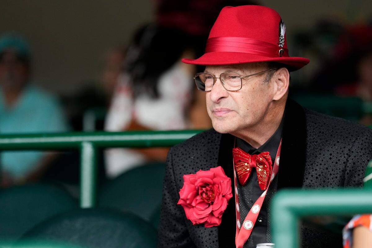 A man watches a race on the day of the 149th running of the Kentucky Derby at Churchill Downs Wednesday, May 3, 2023, in Louisville, Ky. (For the Herald Leader/Bryan Woolston)