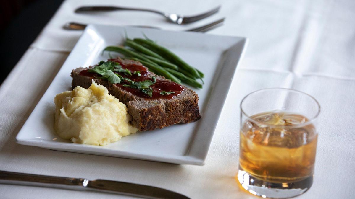 Serafini at 243 West Broadway St., Frankfort, Ky., on Wednesday, March 4, 2020.Meatloaf with a barbecue blackberry sauce and mashed potatoes and green beans at Serafini at 243 West Broadway St., Frankfort, Ky., on Wednesday, March 4, 2020.