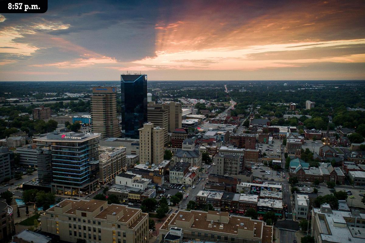 Sunlight streaks through clouds shortly before sunset over downtown Lexington Friday, July 9.