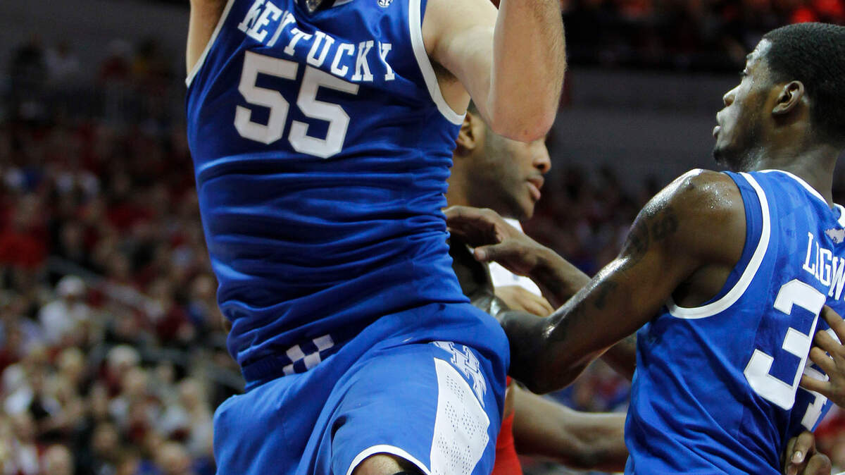 Kentucky's Josh Harrellson grabbed one of his 14 rebounds to go with 23 points against Louisville on Dec. 31. He had 16 points in his last game against Tennessee.  