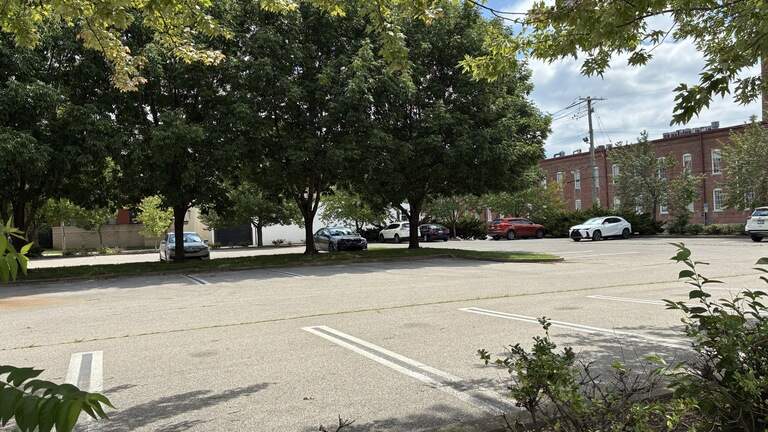 UK wants to sell a small parking lot for at least $6 million. Who wants to buy it?