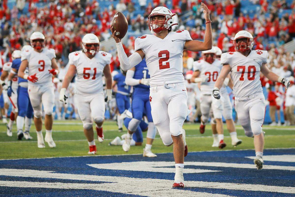 Beechwood’s Cameron Hergott (2) scores a touchdown against Lexington Christian during the Class 2A state finals at Kroger Field on Dec. 3. Beechwood won 23-21.