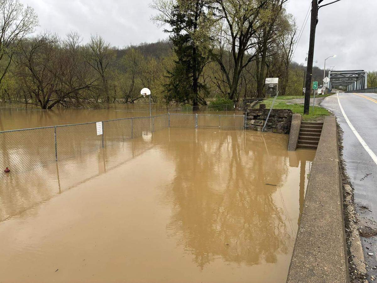 Floodwaters rise Sunday, April 6, 2025, in Butler. Access to Butler was completely shut off Sunday as floodwaters encroached on Pendleton County.