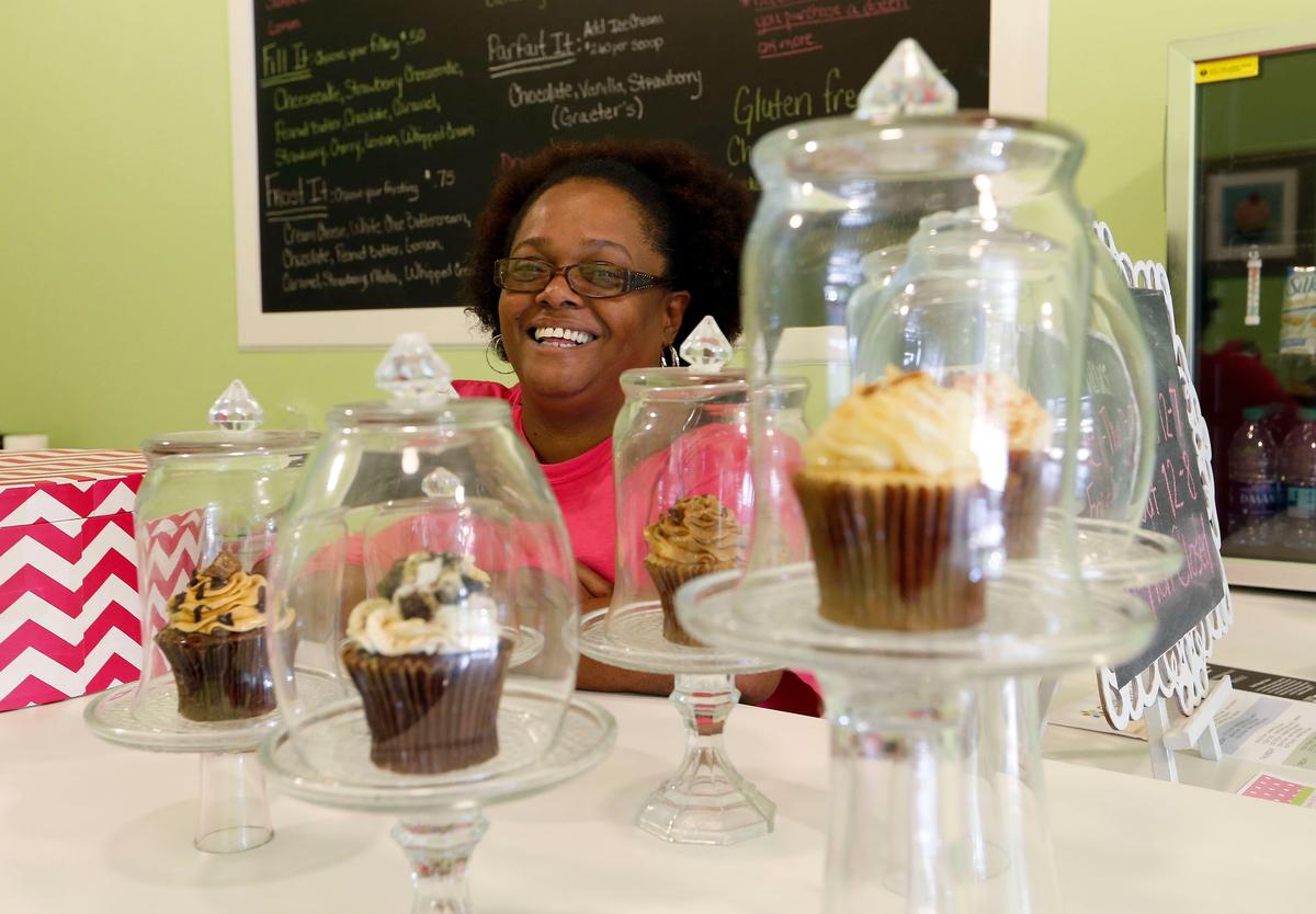 Co-owner Keysha Cuyler in her Make-A-Cake Cupcake Bar at 740 National Avenue. This building has been remodeled to hold several women-owned businesses.