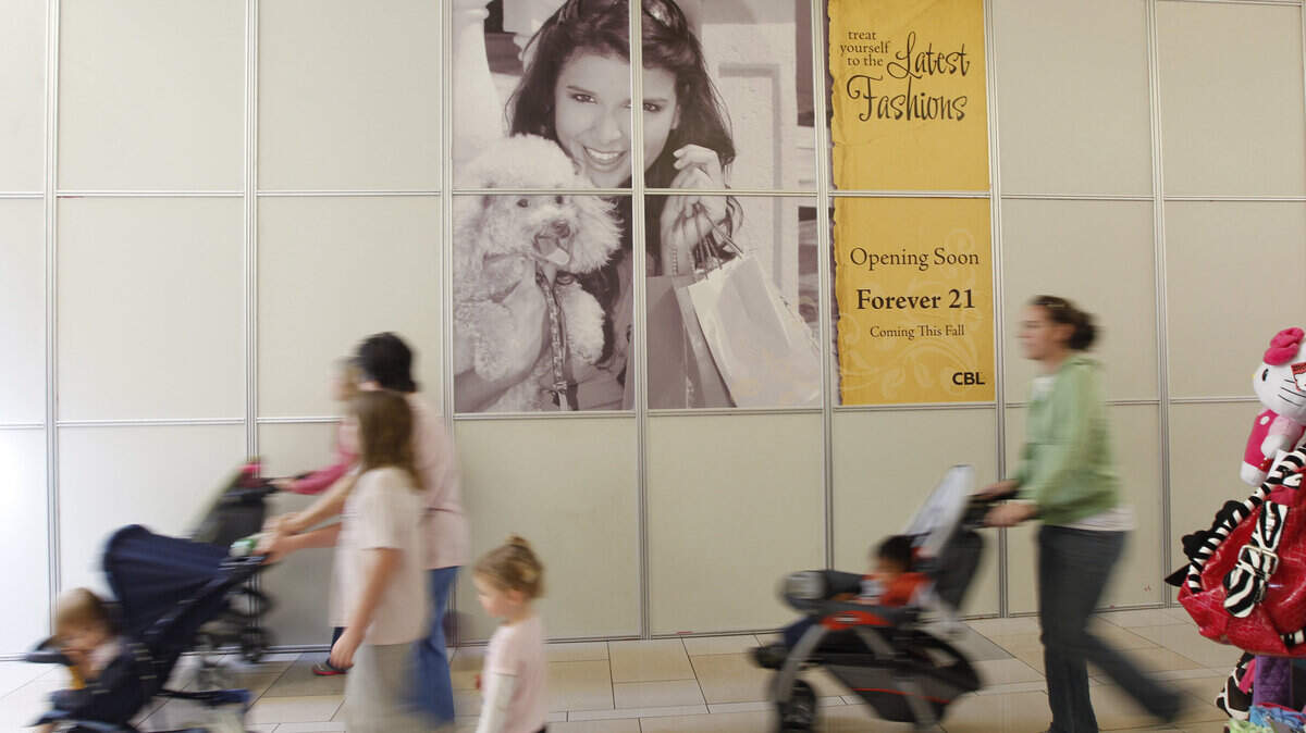 Signs informing customers of changes and renovations are common at the mall. This one is for Forever 21, set to arrive later this fall.