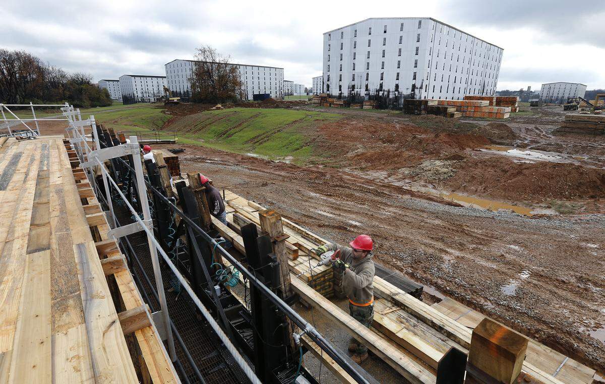 A row of 50,000-barrel bourbon warehouses at the Heaven Hill Distillery in Bardstown, Ky., Thursday, November, 7, 2013. Heaven Hill confirmed that a worker died in a rickhouse accident on Thursday Dec. 19, 2024.