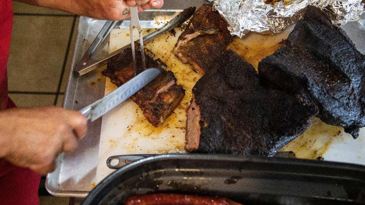 Owner Paul Morin works serving food and cutting brisket at Straight from Texas Bar-B-Que in Richmond, Ky., Thursday, May 6, 2021. The restaurant suffered a fire on March 19, 2026, that may put it out of commission until it can be rebuilt.