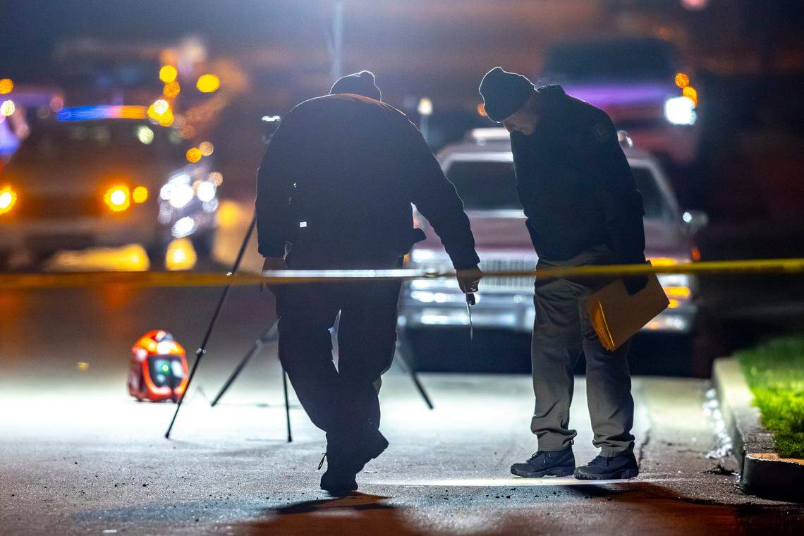 Members of the Lexington Police Department work the scene where a detective was shot overnight near Royal Avenue in Lexington, Ky., on Thursday, Feb. 29, 2024.