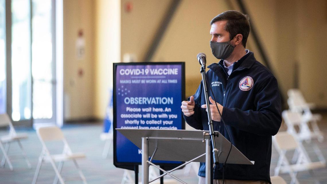 Gov. Andy Beshear speaks with officials at the new high-volume regional vaccination center at the Horse Park in Lexington, Ky., Tuesday, February 2, 2021. The site is being run in partnership with Kroger and will offer 3,000 appointments in the first week. According to Secretary Jim Gray the appointments for the first three days at the vaccination center were filled in about 90 minuets.