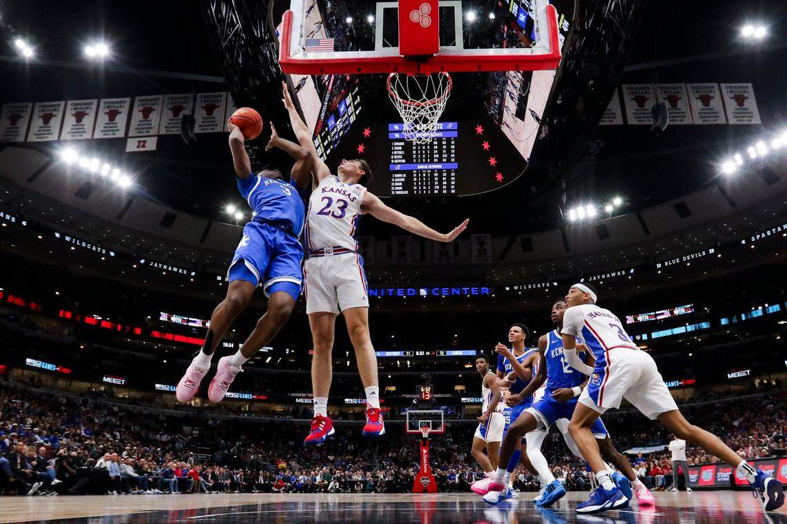 Kentucky guard Adou Thiero (3) shoots the ball against Kansas forward Parker Braun (23) during the State Farm Champions Classic at the United Center in Chicago.