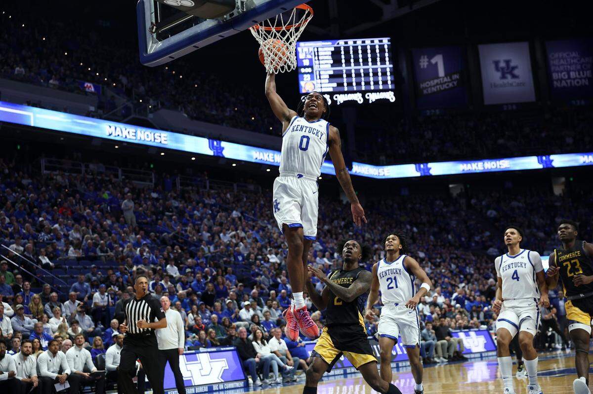 Rob Dillingham dunked during the first half Friday night for two of his 12 points. The UK freshman also had five rebounds and four assists.