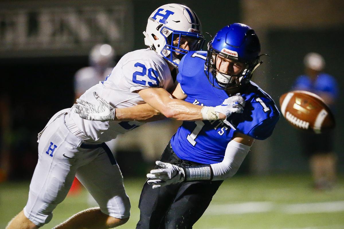 Highlands’ Jacob Brass (29) breaks up a pass intended for Lexington Catholic’s Nathan Schnurr (1) during their game Friday at Lexington Catholic High School.