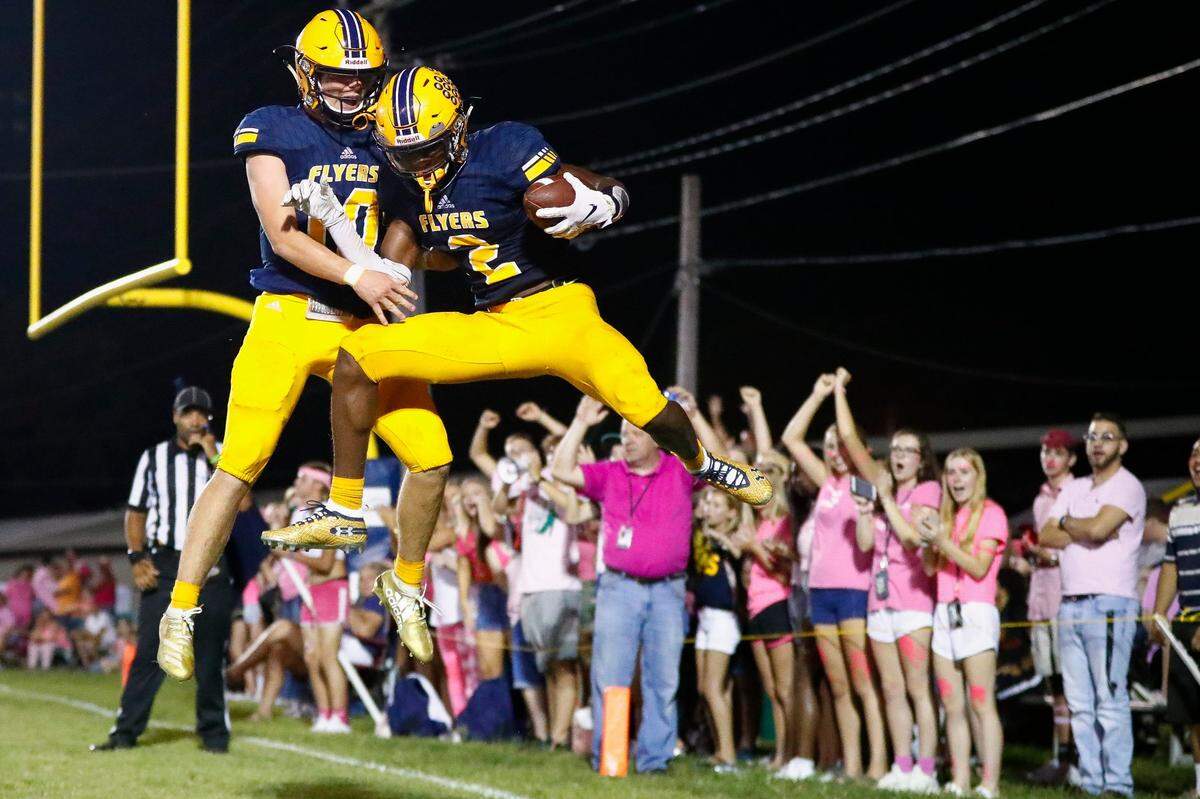 Franklin County’s Nick Broyles (10) and Fred Farrier (2) celebrated a touchdown. The Flyers seniors are two of the top players in the state in 2020.