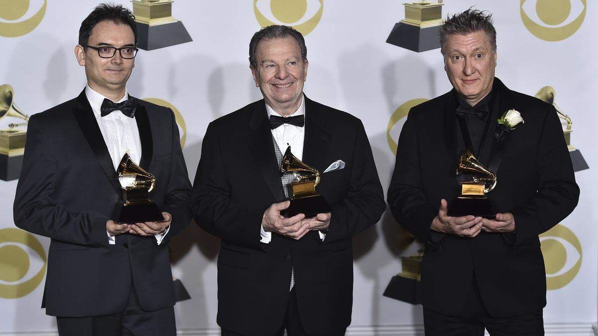 Hector Del Curto, left, Pablo Ziegler, center, and Claudio Ragazzi, of Pablo Ziegler Trio, after their win for best Latin jazz album at the 60th annual Grammy Awards Jan. 28 in New York.