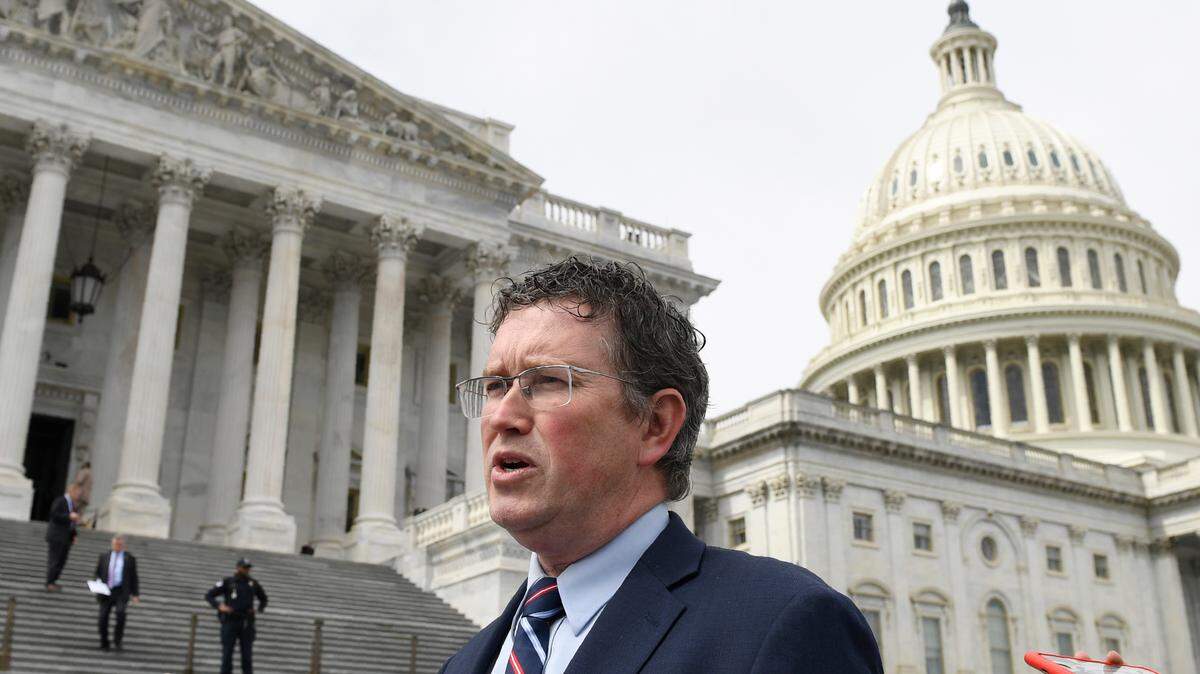Rep. Thomas Massie, R-Ky., leaves Capitol Hill in Washington, Friday, March 27, 2020, after attempting to slow action on a rescue package. Despite Massie’s effort and acting with exceptional resolve in an extraordinary time, the House rushed President Donald Trump a $2.2 trillion rescue package, tossing a life preserver to a U.S. economy and health care system left flailing by the coronavirus pandemic. (AP Photo/Susan Walsh)