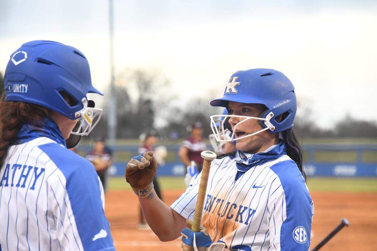 Kayla Kowalik, right, talks with Renee Abernathy during a game at John Cropp Stadium in Lexington during the 2021 season.