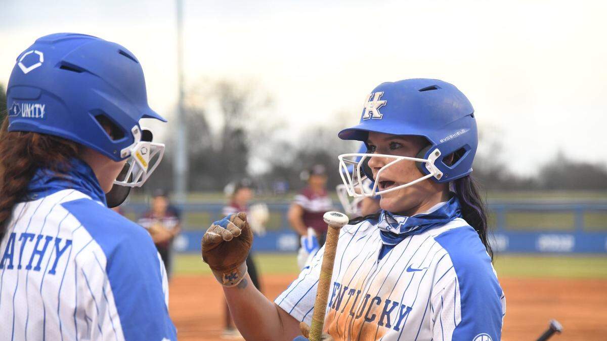 Kayla Kowalik, right, talks with Renee Abernathy during a game at John Cropp Stadium in Lexington last season. Kowalik was a First Team All-America selection.