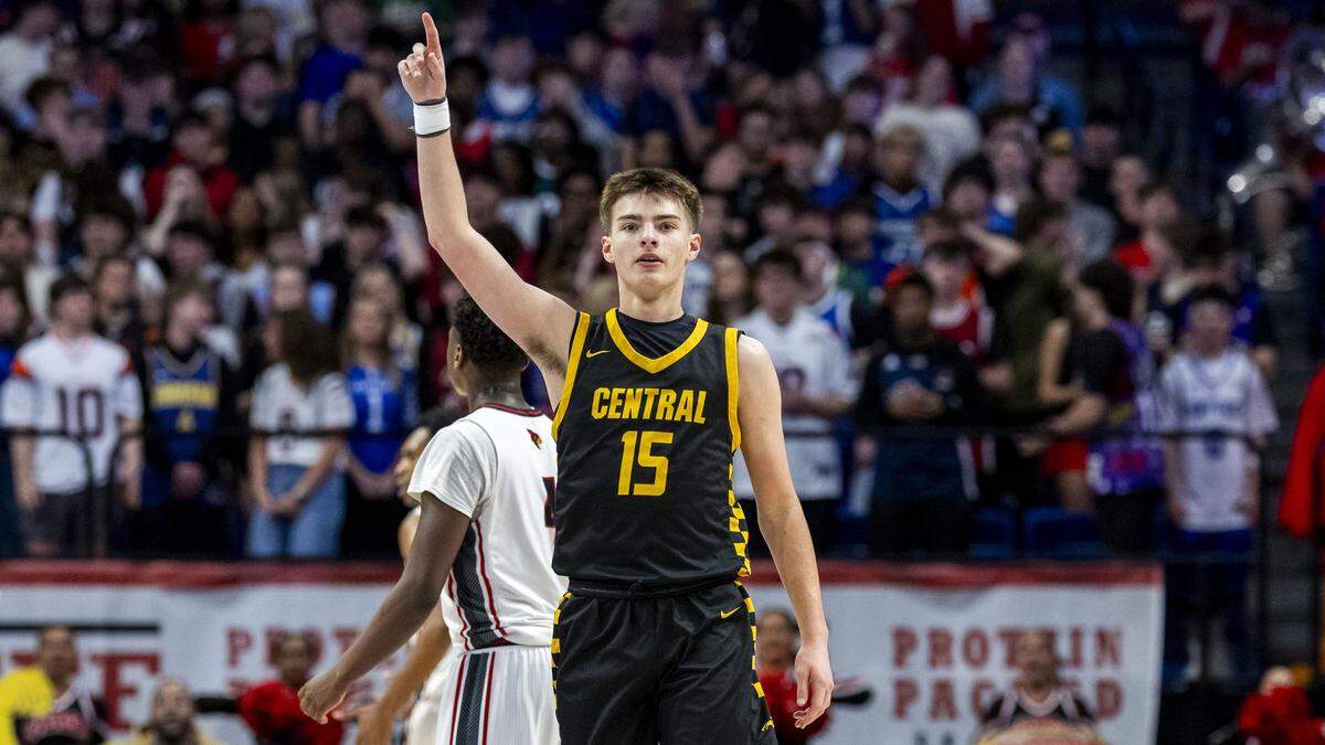 Johnson Central's Cooper Blair (15) celebrates after he made a first half-three pointer during a first-round game in the 2026 UK Healthcare Boys' Basketball Sweet 16 state tournament, Thursday, March 19, 2026 at Rupp Arena in Lexington, Ky.