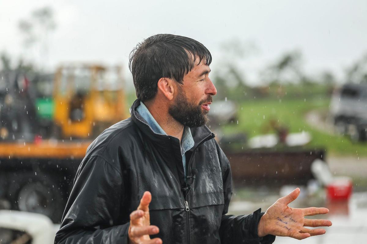 Mahlon Girod, a friend of a family whose home was destroyed by a storm in Washington County, Ky., speaks to members of the media Friday, May 30, 2025.