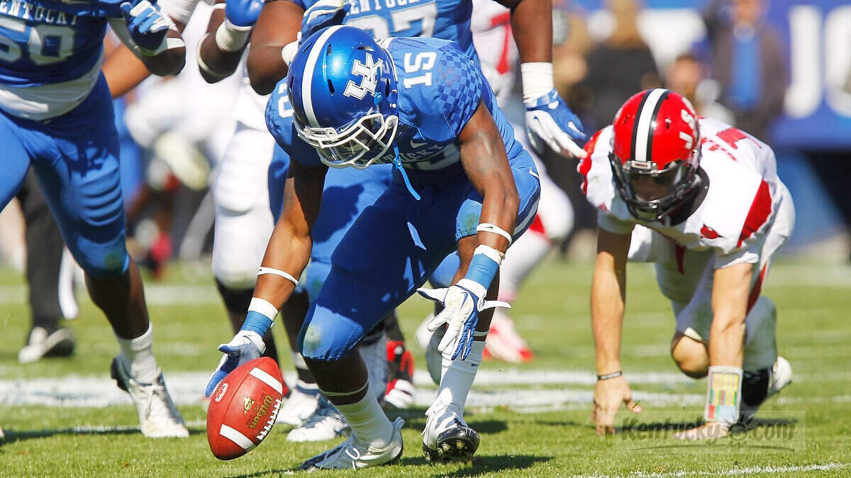 Kentucky's Martavius Neloms picked up fumble and scored in the first quarter of the Jacksonville State at Commonwealth Stadium in Lexington, Ky., on Oct. 22, 2011. Kentucky was up 24-7 at halftime. Photo by Pablo Alcala | Staff 