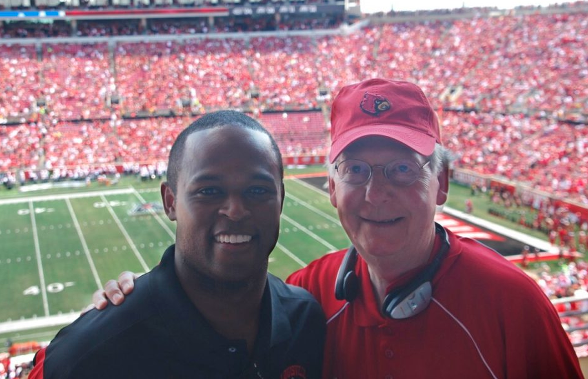 Daniel Cameron and U.S. Sen. Mitch McConnell at a University of Louisville football game