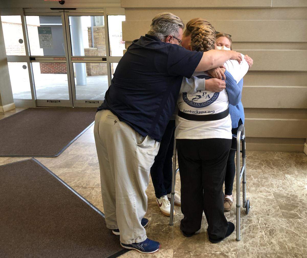 Sheila Thornsberry was embraced by her family as she left Baptist Health Lexington on Friday.