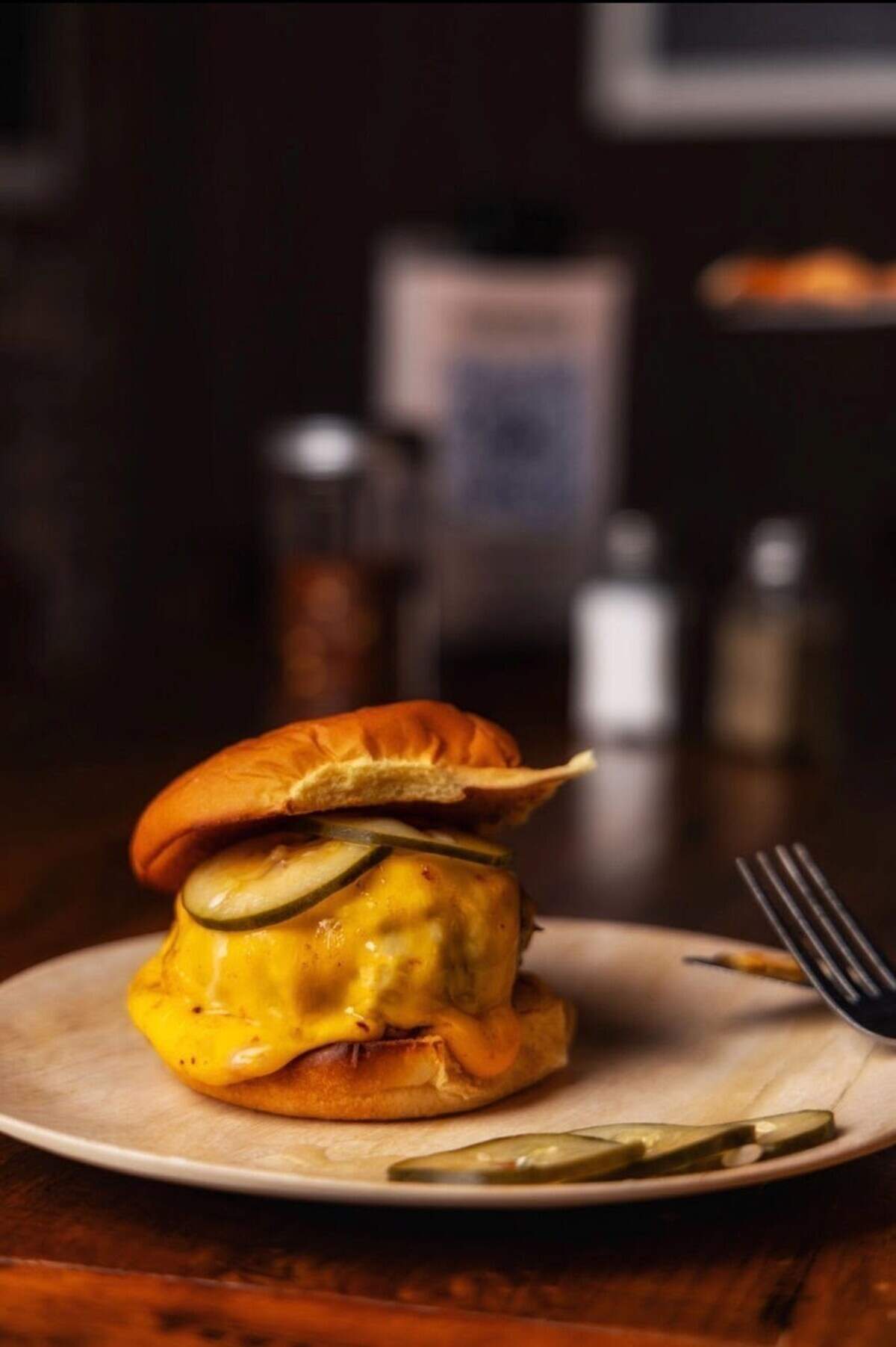 The “Spiteburger” at Deluca’s Pizza has become famous in its own right for its flavor. Restaurant owner Anthony Valinoti created it to satisfy his own hunger for the perfect medium rare burger. It’s made in a cast-iron skillet in a pizza oven.