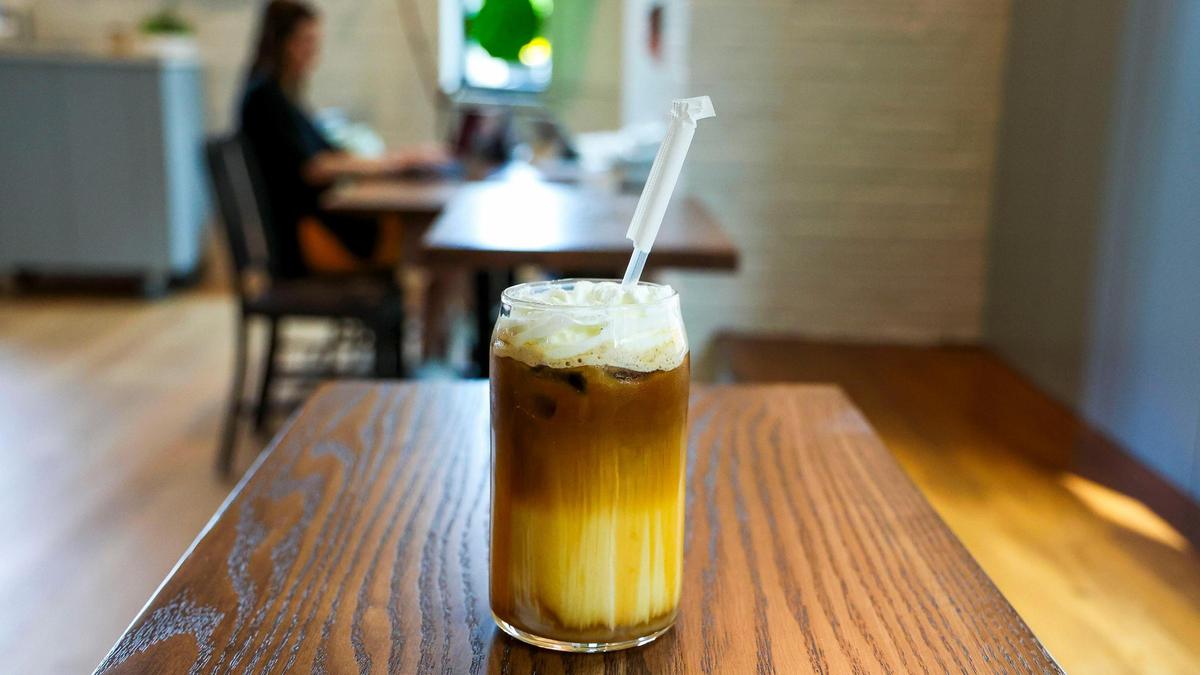 A Caramel Macchiato latte at Old School Coffee, Thursday, May 23, 2025, in Lexington, Ky. All specialty lattes can be served hot, iced or frozen at the local coffee shop which opened a new location May 1 in the Lansdowne Shopping Center.