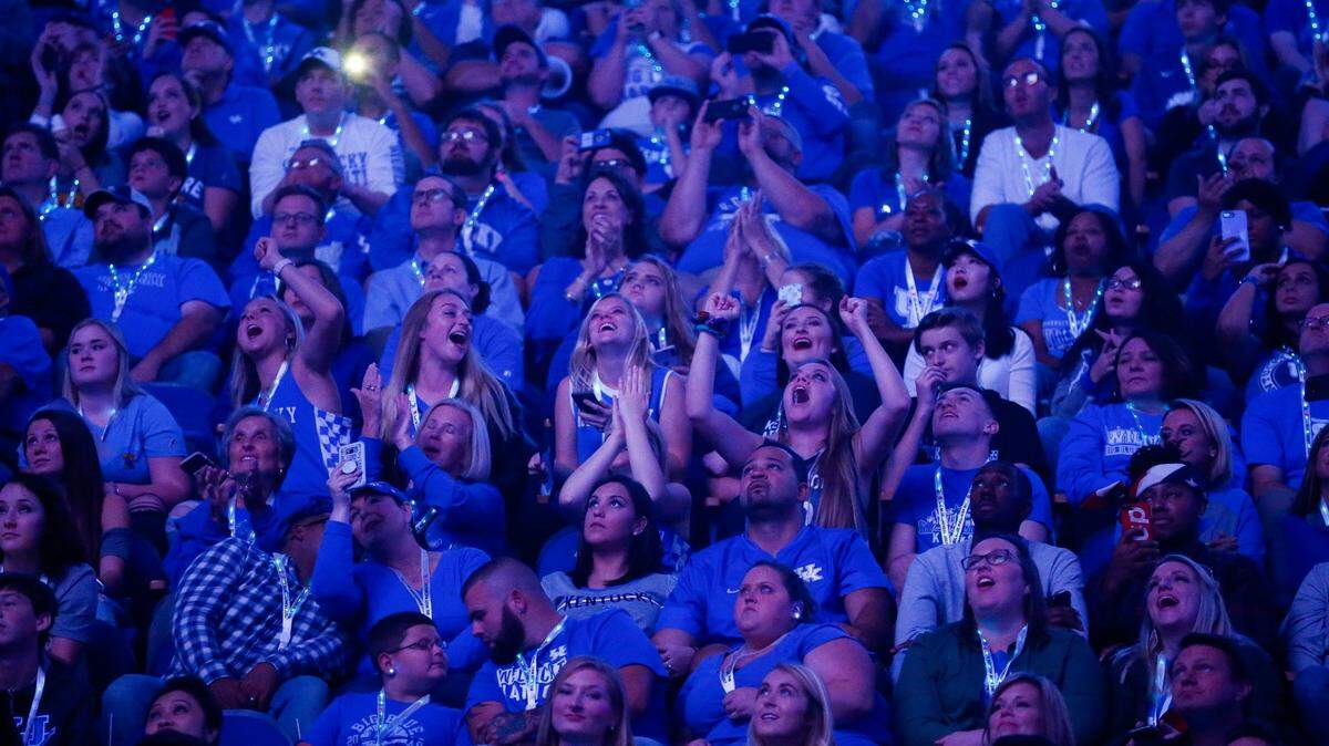 Kentucky fans watch a highlights video before the men’s basketball team takes the court during Big Blue Madness in 2017. Will fans be allowed to pack Rupp Arena again in 2021-22?