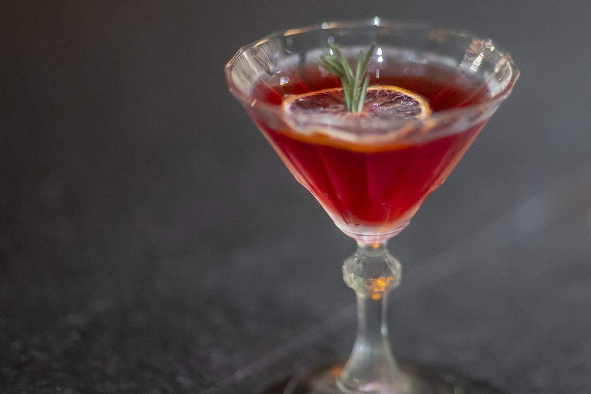 The Emerald Hound's Lady Spaniel Martini features raspberry vodka, Giffard Pamplemousse Lqueur and pomegranate. 