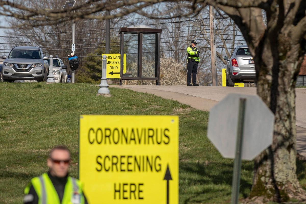 A visitor to the Lexington VA Medical Center-Franklin R. Sousley Campus is screened for the coronavirus in Lexington, Ky., on Friday, March 13, 2020.
